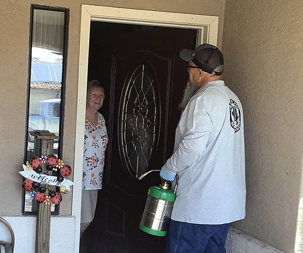 Felix greeting a customer at their home